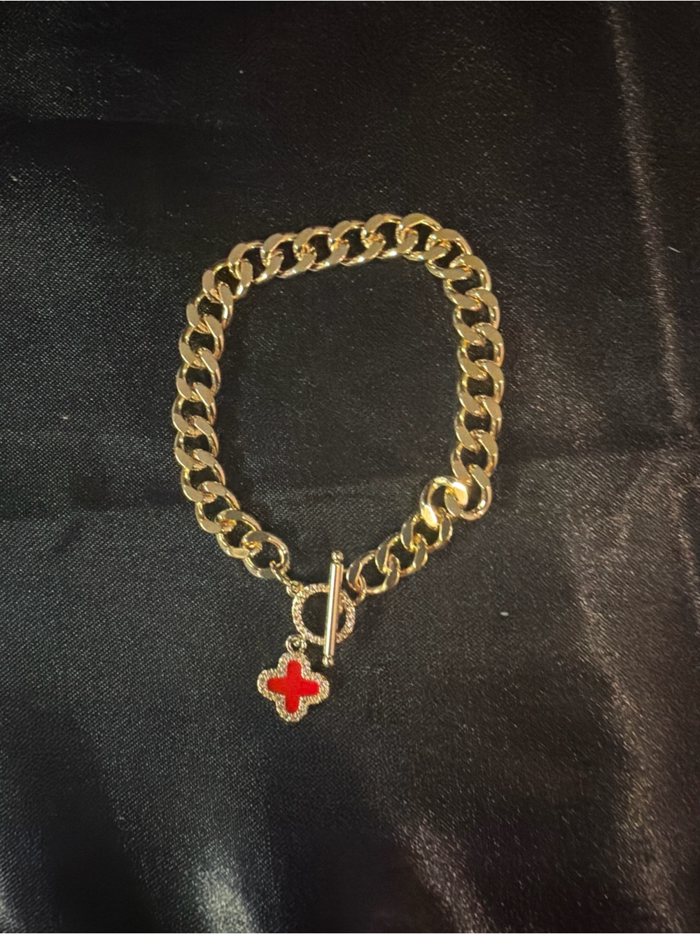 Gold-Tone Chain Bracelet with Red Enamel Clover Charm